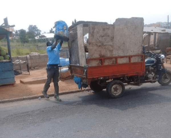 A-tricycle-operator-collecting-waste