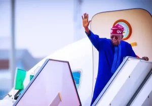 Bola-Tinubu-entering-plane